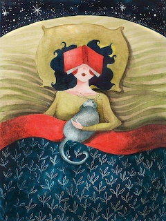 Woman Reading in Bed