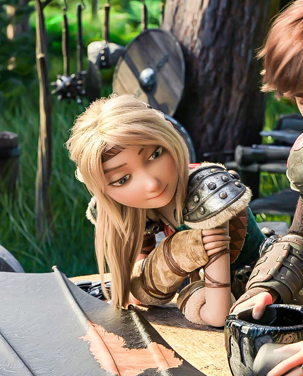 Animated blonde girl sitting at outdoor table with chameleon in garden