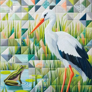 Patchwork quilt with a white stork in tall grass and a green frog beside a pond