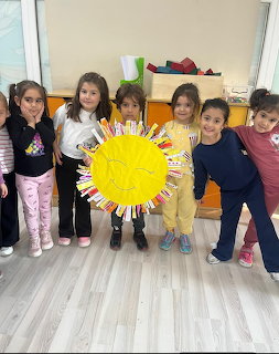 Children Holding Sun Craft