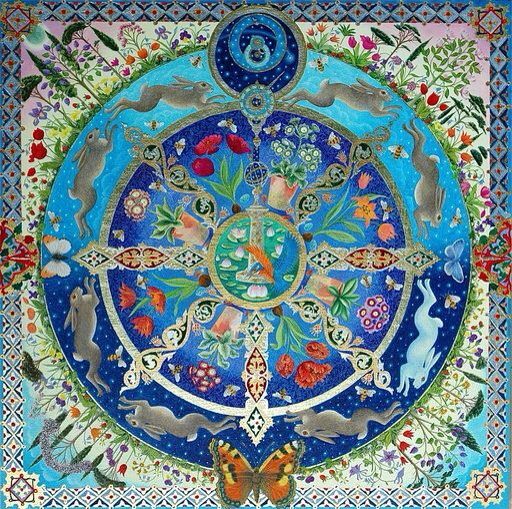 Detailed circular mandala featuring Celtic knotwork, dragons, and decorative floral borders in blue and green tones