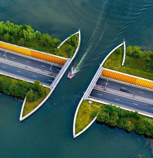 Aerial View of Bridge and Boat
