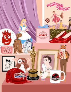Oscar statuette displayed with vintage movie posters, Star Wars figures, and classic Hollywood memorabilia on pink shelving
