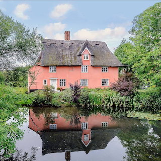 Pink Cottage by Lake