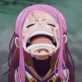 Close-up of anime girl Bonney with pink hair crying and tears streaming down her face