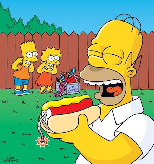 Homer Simpson eating oversized hot dog with family watching in backyard