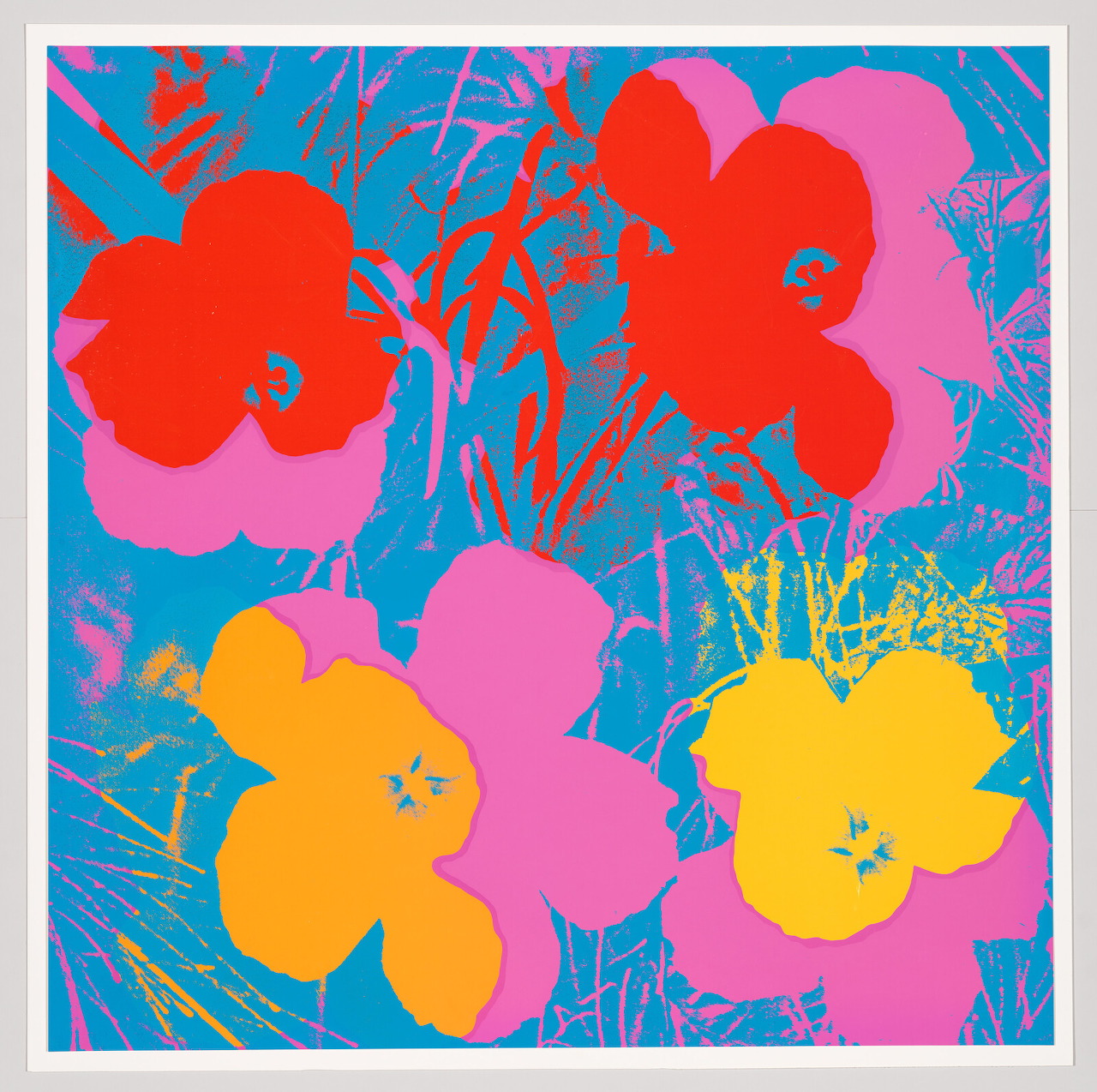 Pop art flowers in bright pink, red, yellow, orange on blue background