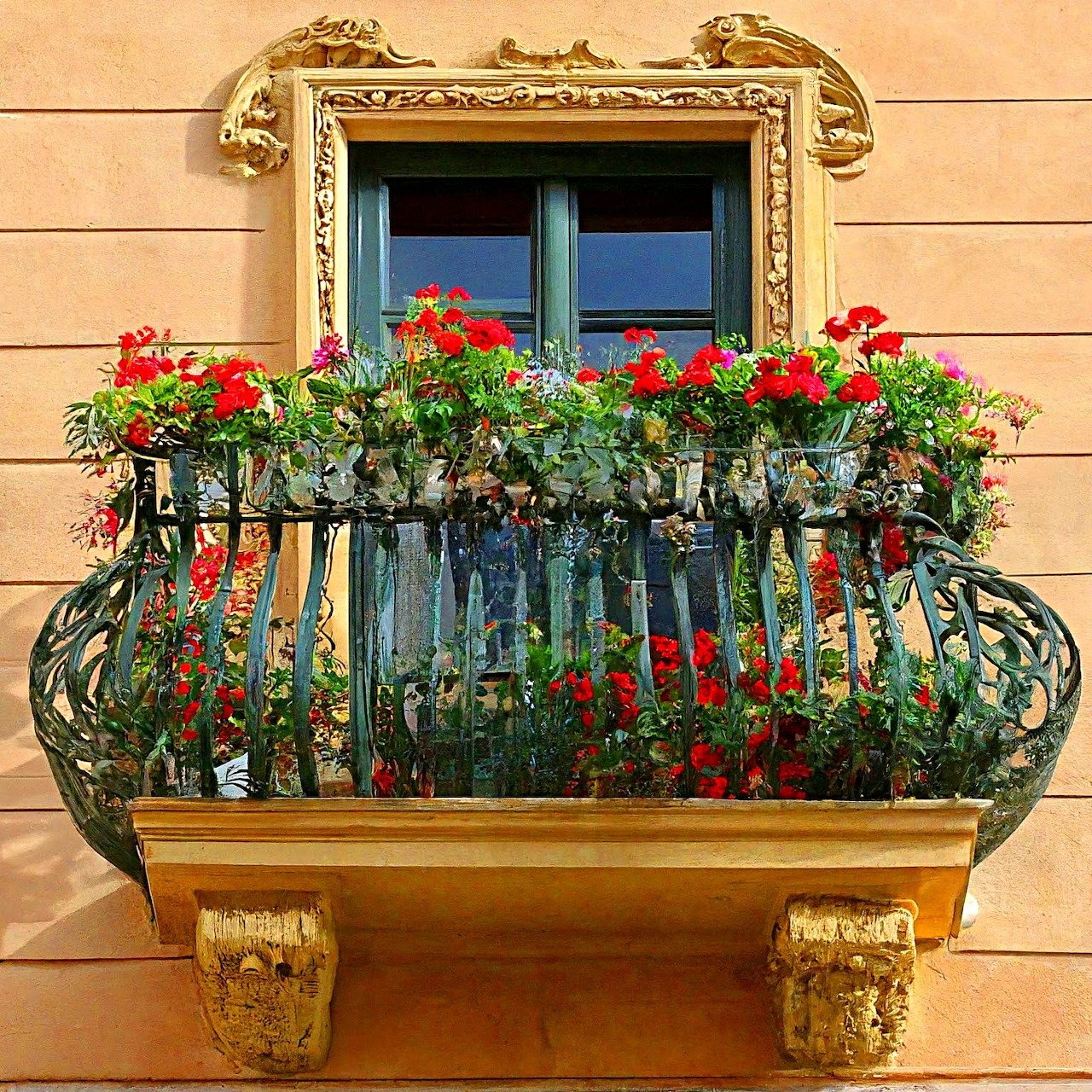 Balcony with Red Geraniums