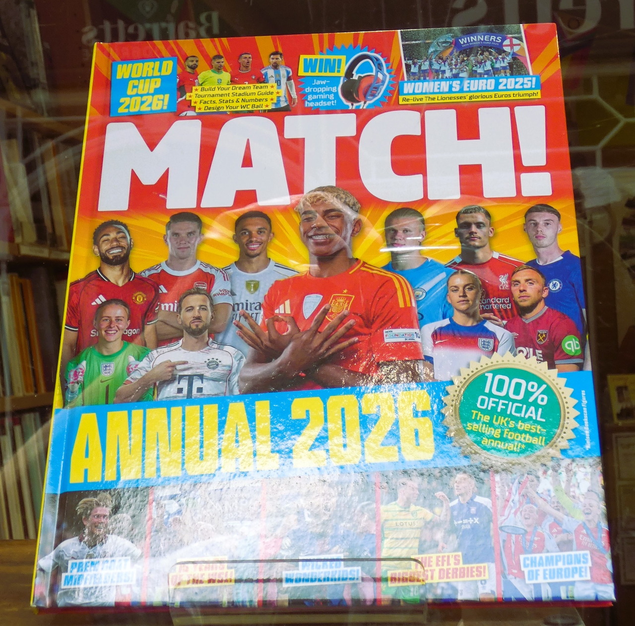 Match Annual 2026 football magazine cover with players in red, yellow, and blue jerseys