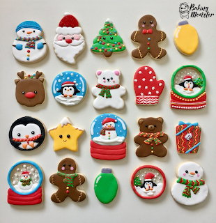 Assorted decorated Christmas sugar cookies in holiday shapes including Santa, snowmen, gingerbread men, and ornaments
