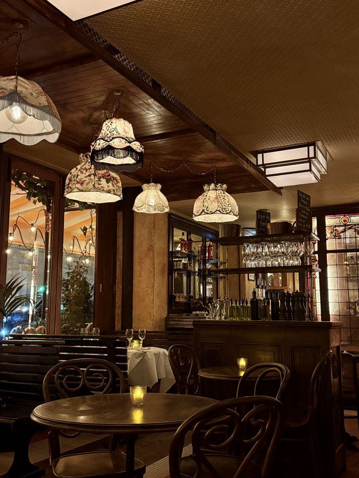 Parisian café with flower-decorated facade and outdoor seating