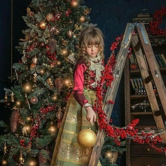 Girl by Christmas Tree