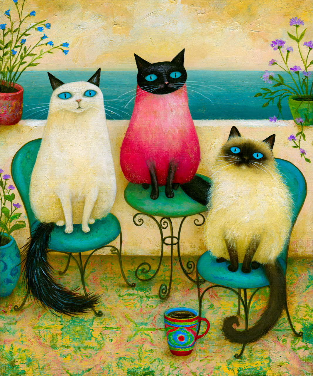 Three stylized cats seated on chairs and a table by the sea with flowers around them
