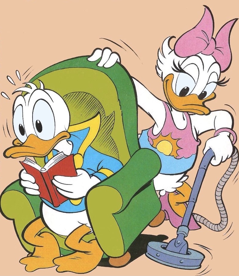 Donald Duck reading book while Daisy Duck uses vacuum cleaner, both in casual home attire
